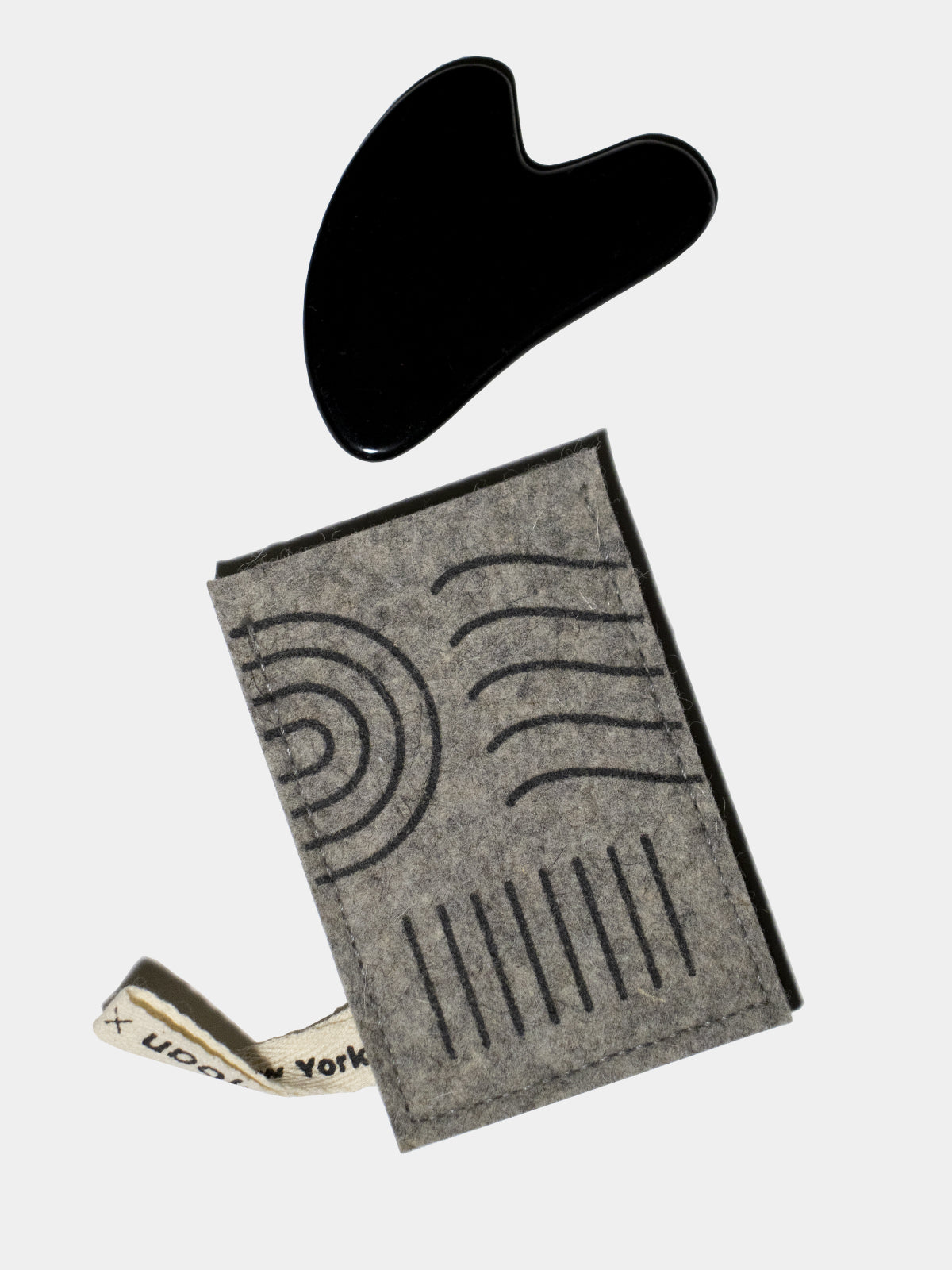 Light grey wool gua sha protector with graphic dark grey print